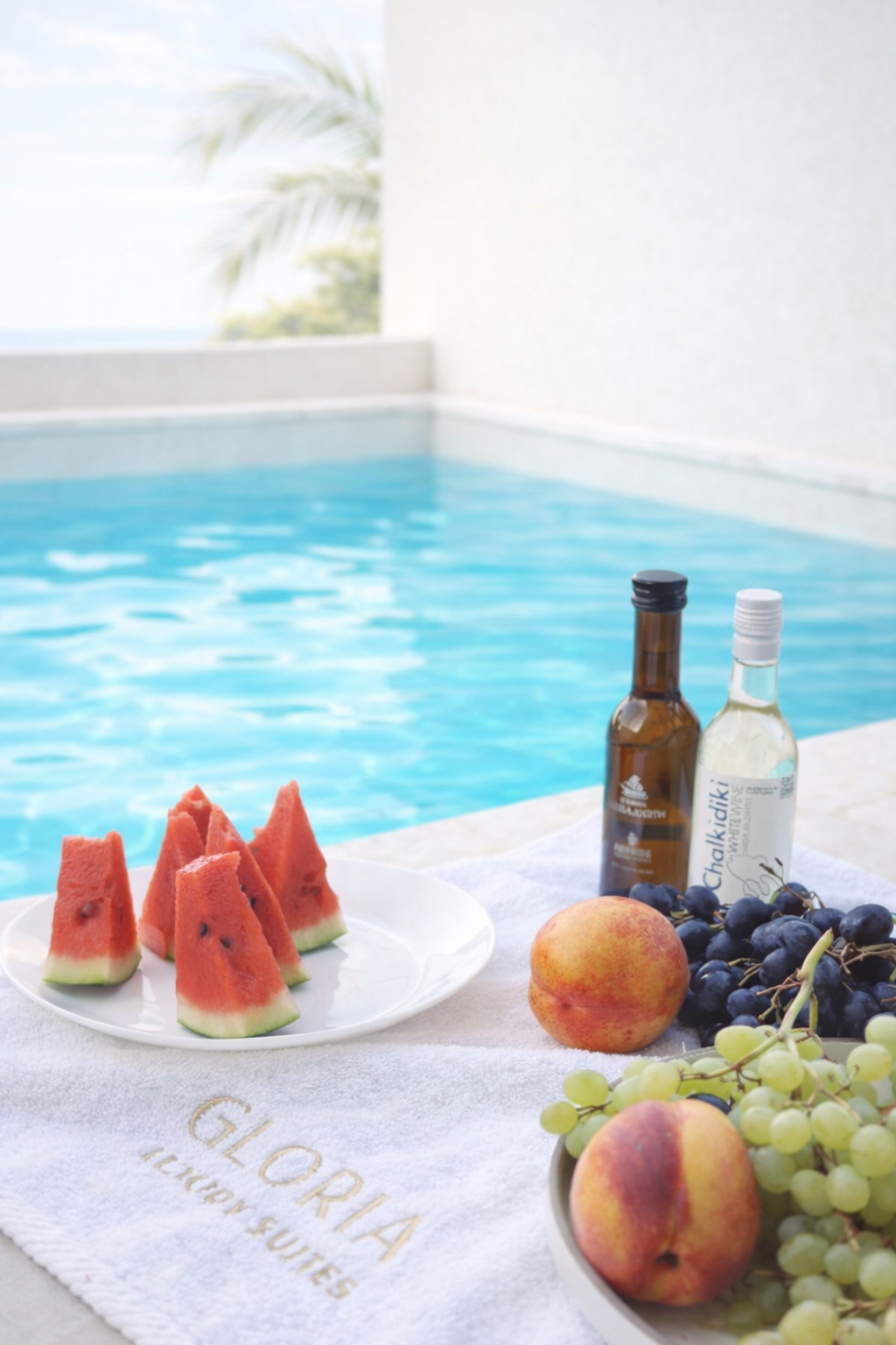 Fresh watermelon and local Halkidiki wine poolside